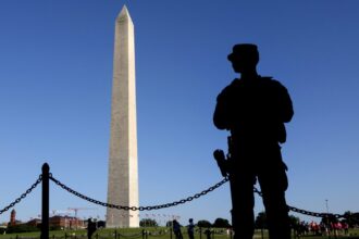 Soldier faces felony for pulling gun over grooming standards fight
