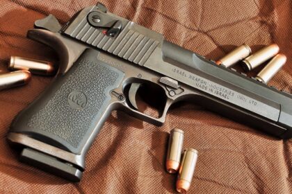 I Am a Retired US Army Special Forces NCO: A 300-Grain .50 Action Express Round Leaves a Desert Eagle at About 1,542 Feet Per Second With Roughly 1,500 Foot-Pounds Behind It. That Is Closer to a Lever-Action Rifle Than to Any Other Handgun.