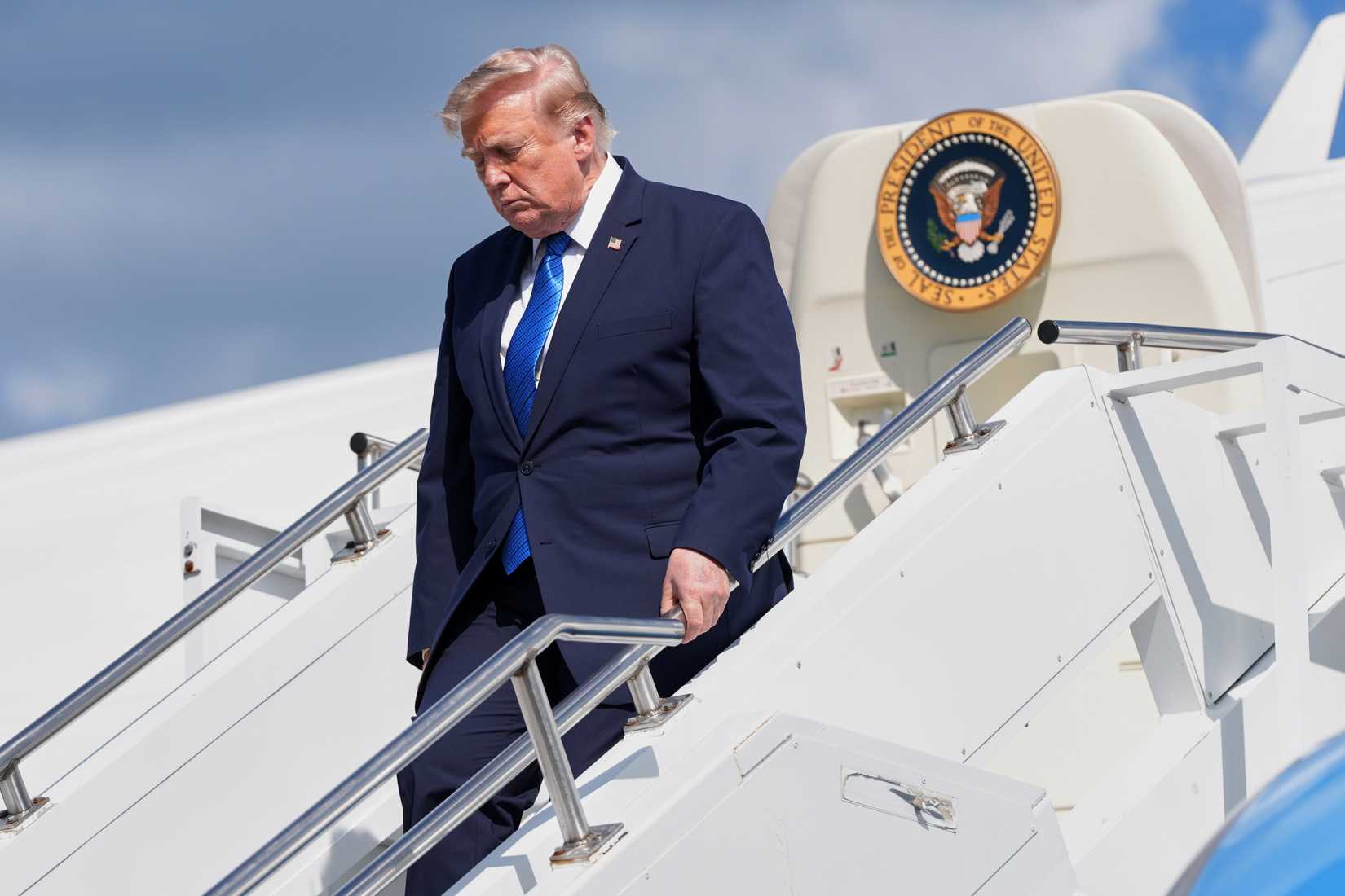 President Trump exits Air Force One in Morristown, New Jersey, on Friday, July 31, 2026. (AP Photo/Jacquelyn Martin).
