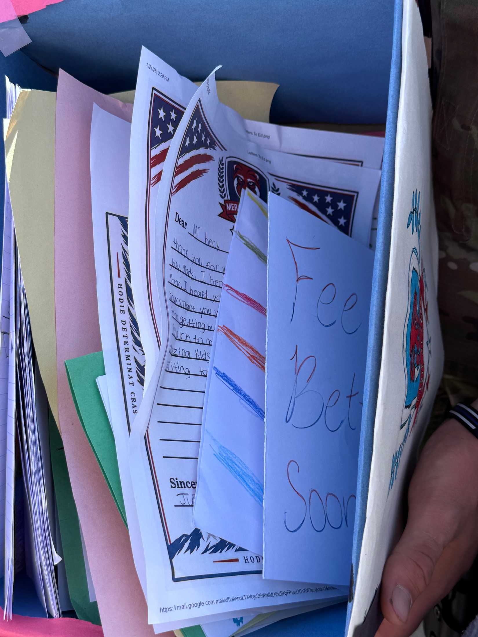 Box of cards written by Merit academy students